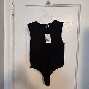 Black, sleeveless body suit. Size medium